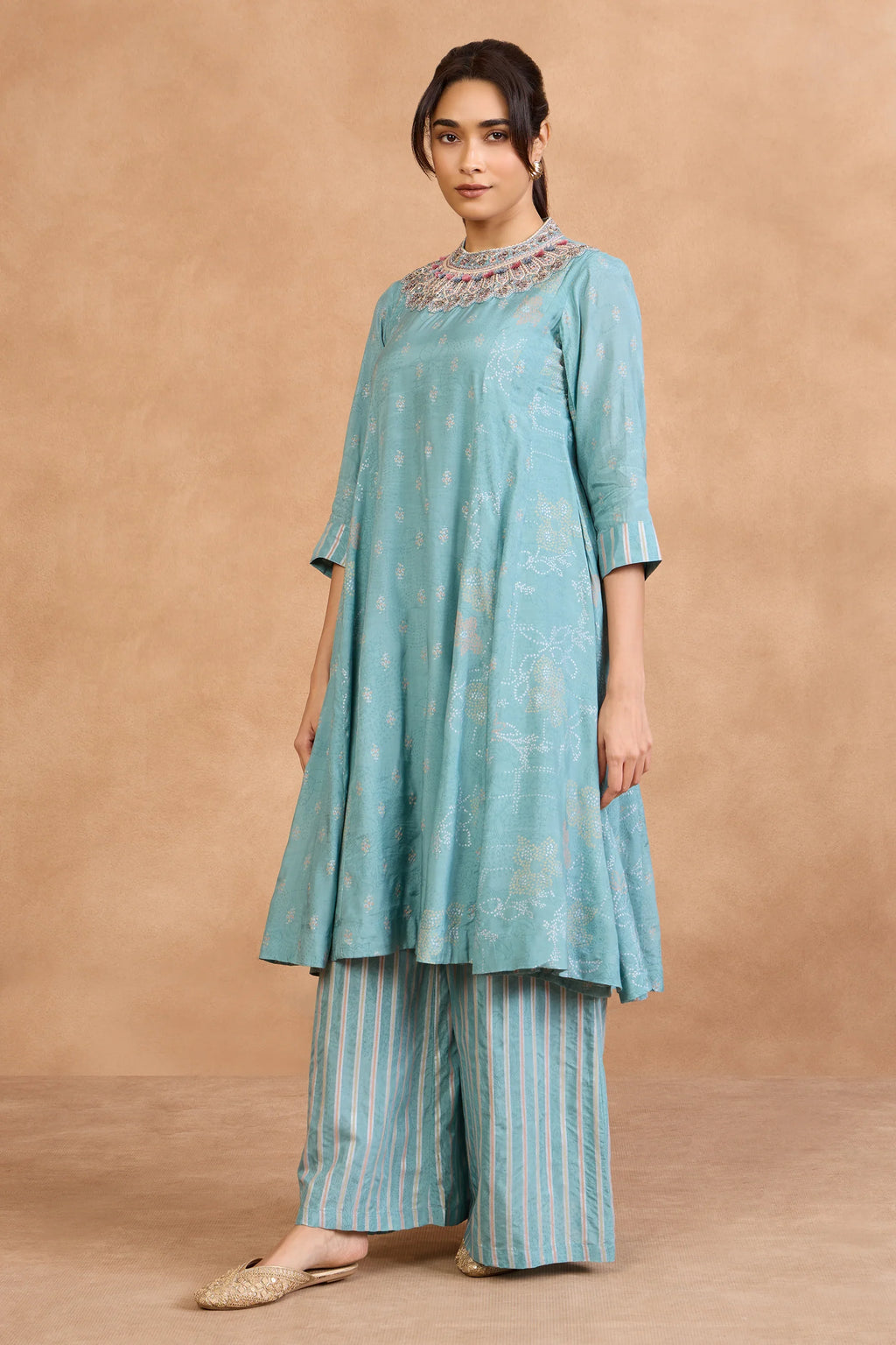Teal embroidered kurta with striped palazzo pants, festive Indian outfit for special occasions