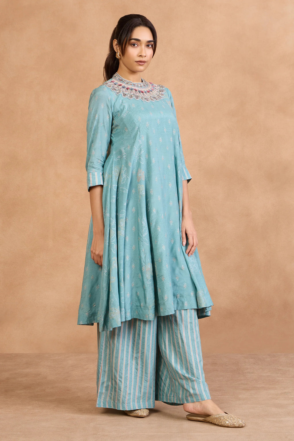 Turquoise embroidered kurta with striped palazzo pants, festive Indian outfit for special occasions