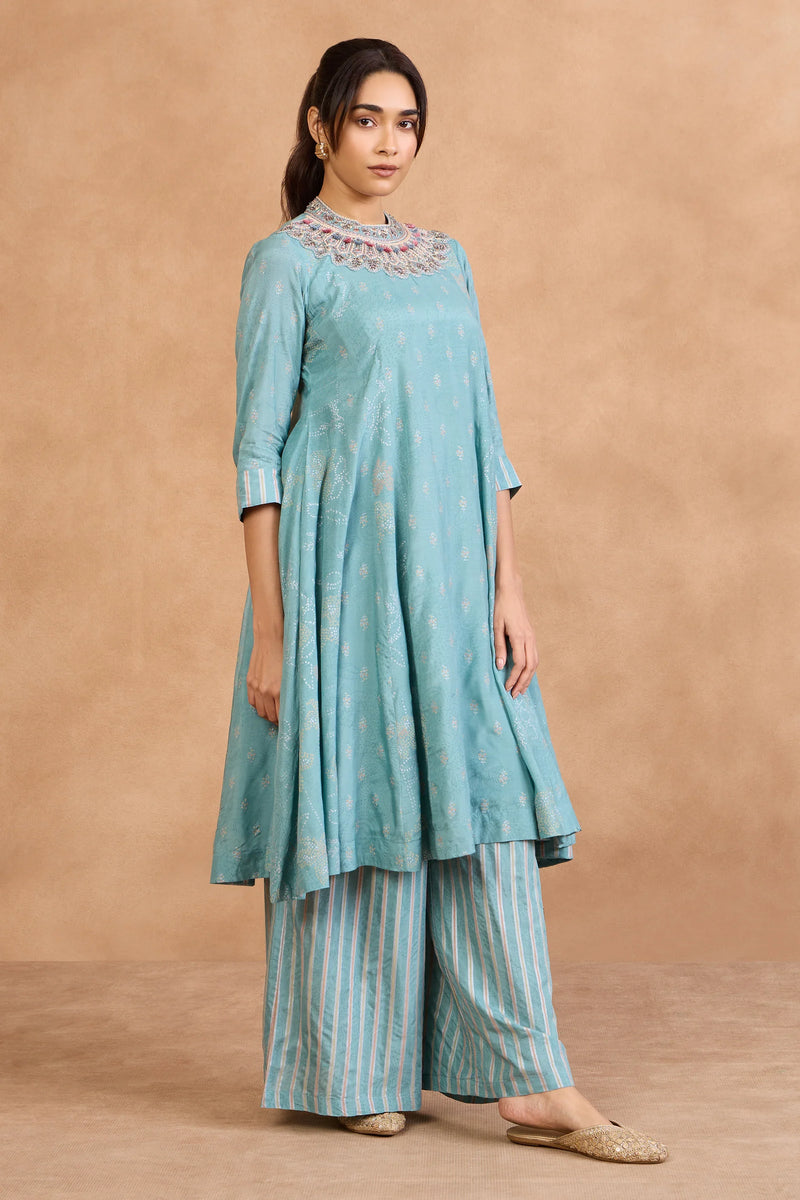 Turquoise embroidered kurta with striped palazzo pants, festive Indian outfit for special occasions